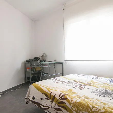 Rent this 4 bed room on Carrer del Reverend Rafael Tramoyeres in 44, 46020 Valencia