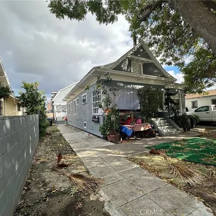 Buy this 11 bed house on Woodlawn Avenue in Los Angeles, CA 90011