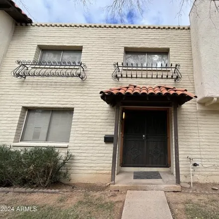 Rent this 3 bed townhouse on 1953 West Highland Avenue in Phoenix, AZ 85015