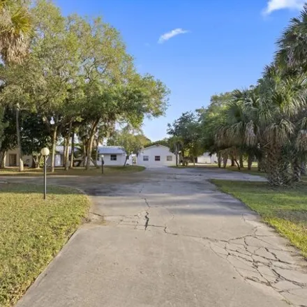 Buy this 6 bed house on 1599 D'Albora Road in Brevard County, FL 32953
