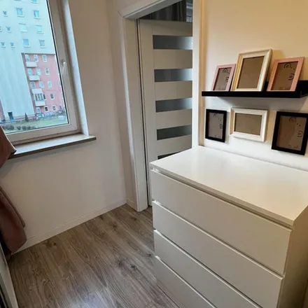 Rent this 2 bed apartment on Marchołta in 31-479 Krakow, Poland