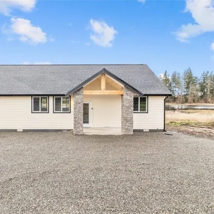 Buy this 4 bed house on 9908 237th Street Ct E in Graham, Washington