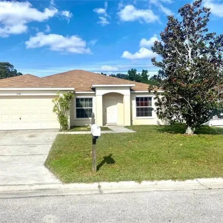 Buy this 4 bed house on 1662 Saddlehorn Drive in Polk County, FL 33810