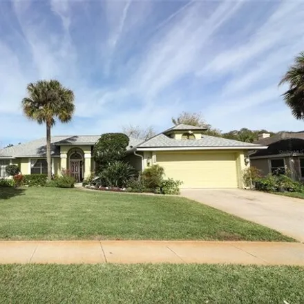 Buy this 4 bed house on 5329 Goldenwood Drive in Orange County, FL 32817