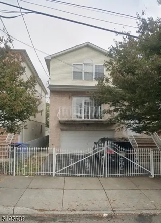 Buy this 6 bed townhouse on 56 Clifton Street in Newark, NJ 07114
