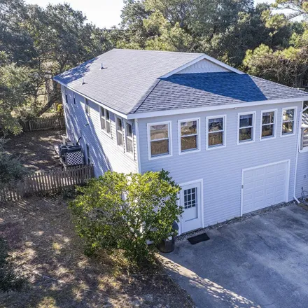Buy this 4 bed house on 428 West Sothel Street in Kill Devil Hills, NC 27948