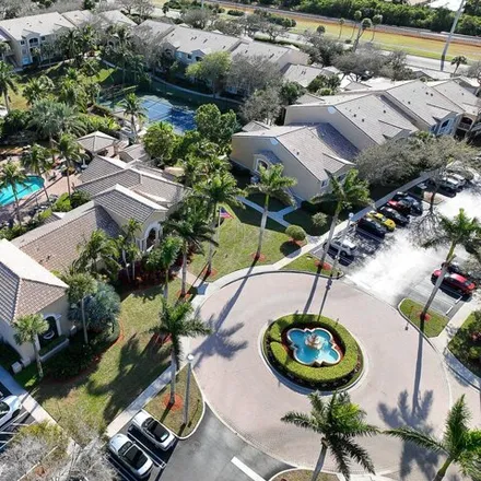 Buy this 2 bed condo on Village Boulevard in Tequesta, Palm Beach County