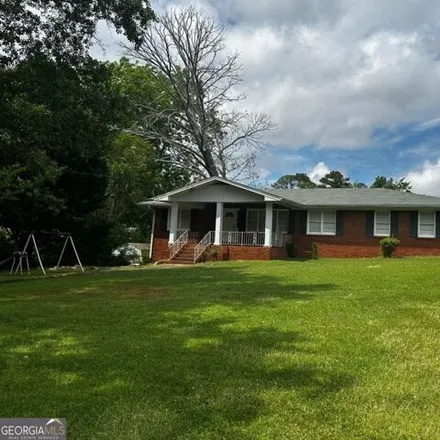 Buy this 3 bed house on 4004 Camelot Court in Tucker, GA 30084