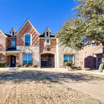 Buy this 4 bed house on 3048 England Parkway in Grand Prairie, TX 75054