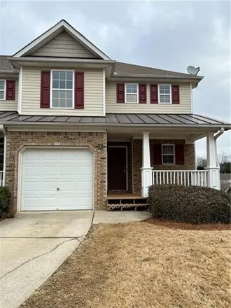 Rent this 2 bed townhouse on 398 Fox Overlook in Holly Springs, GA 30188