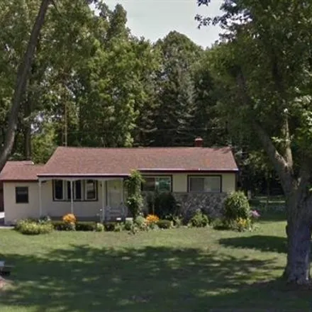 Buy this 4 bed house on 7162 North Center Road in Genesee Township, MI 48458