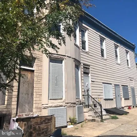 Buy this 4 bed townhouse on 2117 North Fulton Avenue in Baltimore, MD 21217