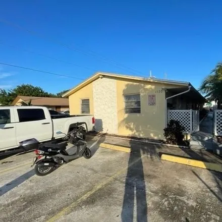 Rent this 2 bed house on 1131 12th Avenue North in Lake Worth Beach, FL 33460