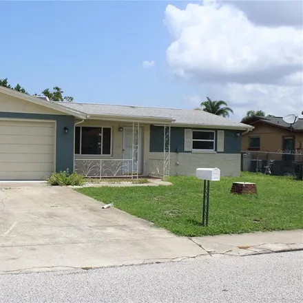 Buy this 2 bed house on 7333 Westcott Drive in Jasmine Estates, FL 34668