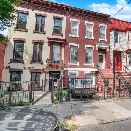 Buy this 4 bed townhouse on 1101 Madison Street in New York, NY 11221