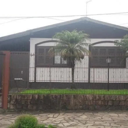 Buy this 3 bed house on Rua Alfredo Emílio Alem 400 in Dom João Becker, Gravataí - RS