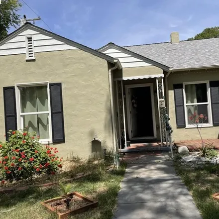 Buy this 3 bed house on 1895 West Willow Street in Stockton, CA 95204