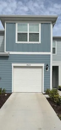 Rent this 3 bed townhouse on Sparkling Shell Avenue in Osceola County, FL 34746