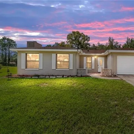 Buy this 3 bed house on 7974 North Omega Way in Citrus Springs, FL 34434