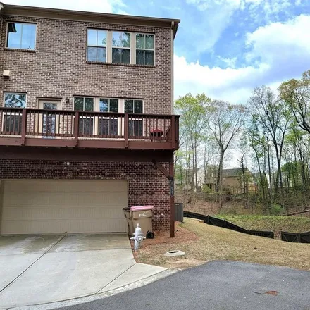 Rent this 4 bed apartment on 614 Northolt Parkway in Suwanee, GA 30024