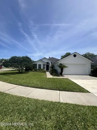 Rent this 4 bed house on 2309 Millford Lane West in Jacksonville, FL 32246