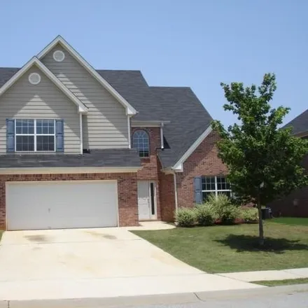 Rent this 4 bed house on 880 Parkside Place Avenue in McDonough, GA 30253