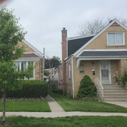 Buy this 4 bed house on 7204 South Springfield Avenue in Chicago, IL 60629