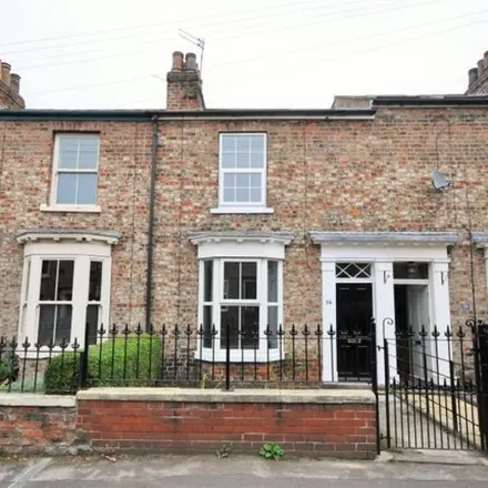 Rent this 3 bed townhouse on Tesco Express in 9-11 Low Ousegate, York