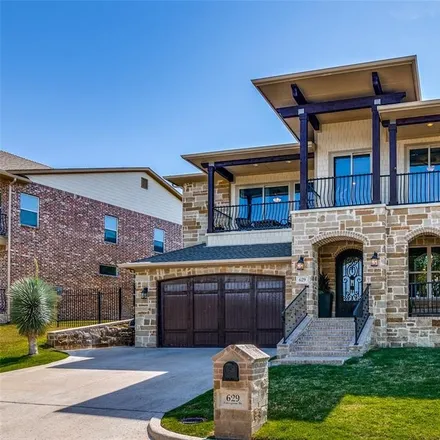 Buy this 5 bed house on 629 Courageous Drive in Rockwall, TX 75032