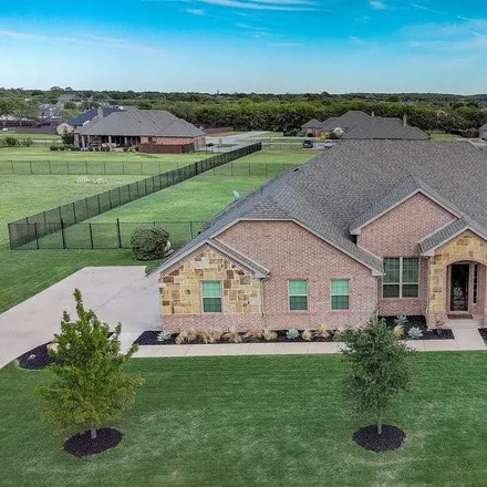 Buy this 4 bed house on 3399 Marposa Ridge in Johnson County, TX 76036