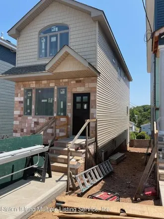 Buy this 3 bed house on 228 Fingerboard Road in New York, NY 10305