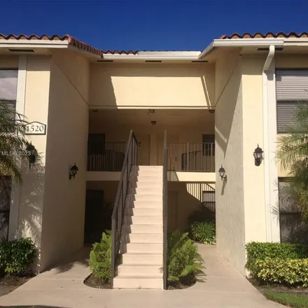 Rent this 2 bed apartment on 1519 Lake Crystal Drive in Golden Lakes, Palm Beach County