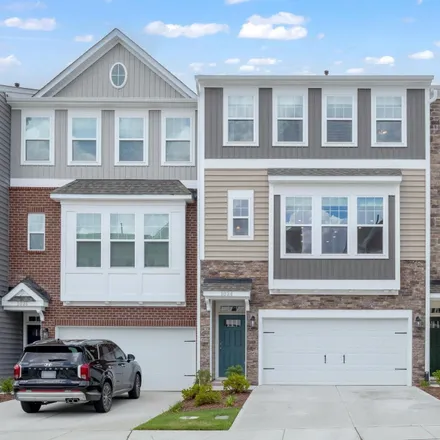 Buy this 4 bed townhouse on Falling Rock Place in Durham, NC 27617
