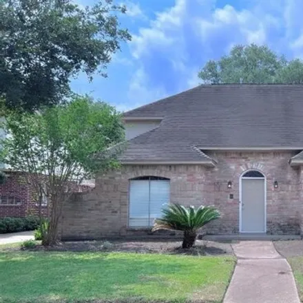 Rent this 4 bed house on 12235 Rocky Knoll Drive in Houston, TX 77077