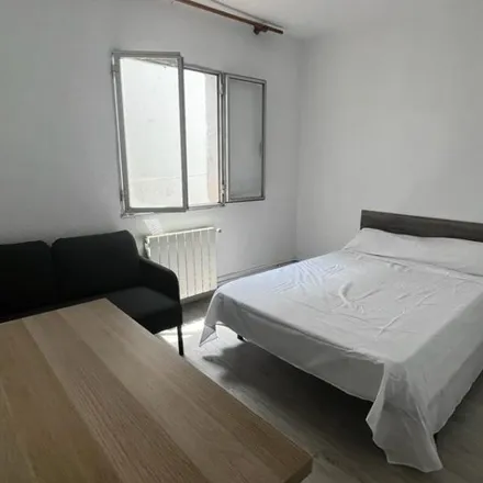 Rent this 4 bed room on Calle de Villasandino in 16, 28011 Madrid