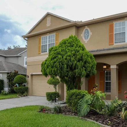 Buy this 6 bed house on 9866 Heron Pointe Drive in Lake Hart, Orange County