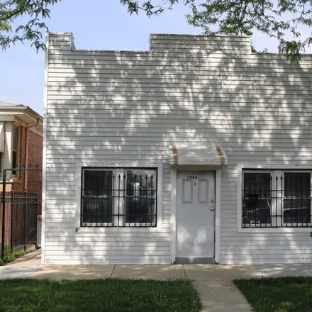 Buy this 4 bed house on 1446 North Central Park Avenue in Chicago, IL 60647