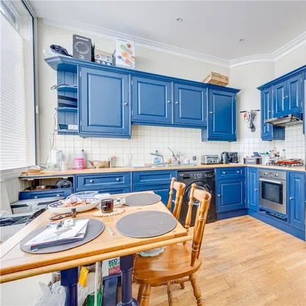 Rent this 2 bed townhouse on The Decorating Centre in 163 Dawes Road, London