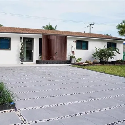 Buy this 4 bed house on 758 Northwest 8th Avenue in Dania Beach, FL 33004