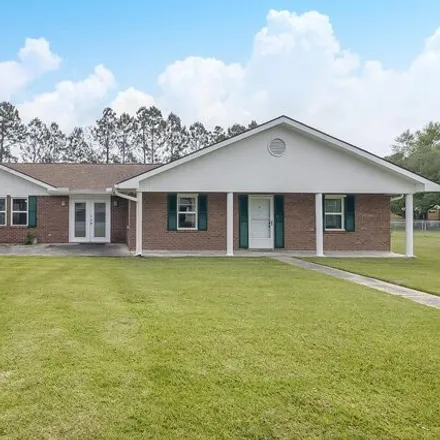 Buy this 4 bed house on 122 Espana Park in Waveland, MS 39576