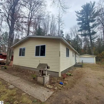 Buy this 3 bed house on 1130 Beaver St in Oscoda, Michigan