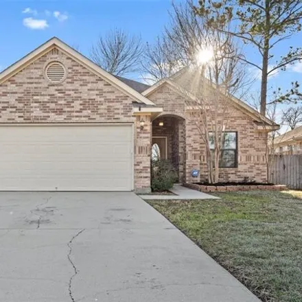 Buy this 3 bed house on 13571 Raintree Drive in Montgomery County, TX 77356
