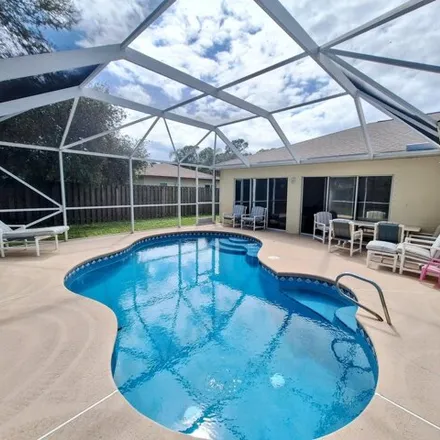 Buy this 3 bed house on 187 Cownie Avenue Southeast in Palm Bay, FL 32909