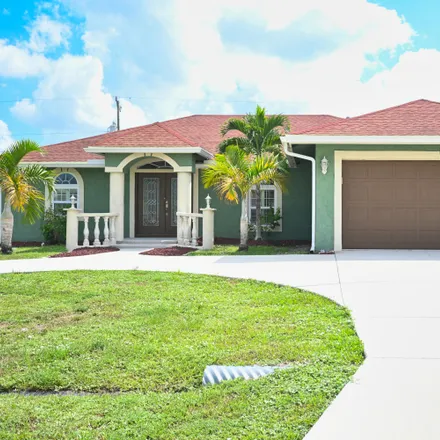 Buy this 4 bed house on 3294 Southeast Quay Street in Port Saint Lucie, FL 34984