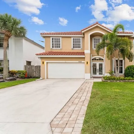 Rent this 4 bed house on 7349 Oakboro Dr in Lake Worth, Florida