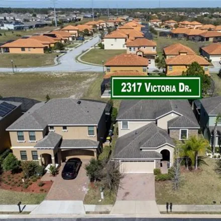 Buy this 6 bed house on 2317 Victoria Dr in Davenport, Florida
