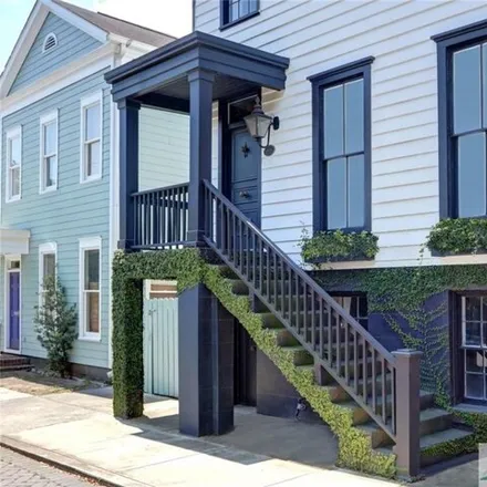 Buy this 4 bed townhouse on 513 East McDonough Street in Savannah, GA 31401