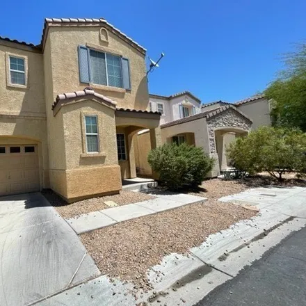Rent this 3 bed house on 1384 East Oak Village Avenue in Paradise, NV 89183