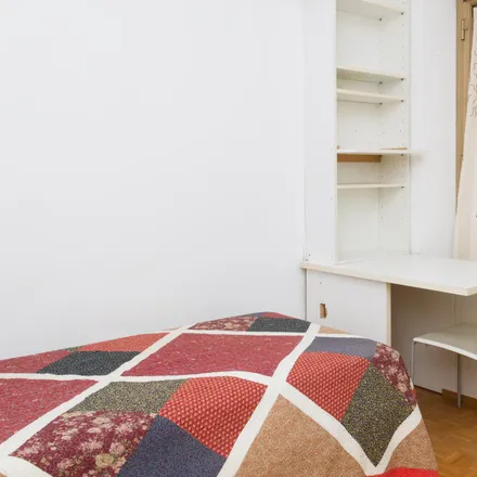 Rent this 2 bed room on Viale Mario Rapisardi in 4, 20161 Milan MI