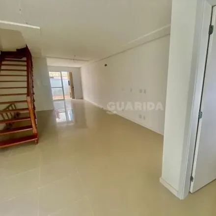Rent this 3 bed house on Rua Cláudio Water Ferreira in Guarujá, Porto Alegre - RS
